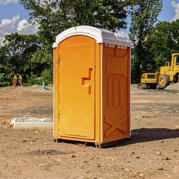 what is the cost difference between standard and deluxe portable restroom rentals in Mendota